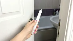 Once a month, I go to the bathroom and take a regular candle with me. This solves three problems at once.