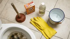 How to unclog a toilet without calling a plumber